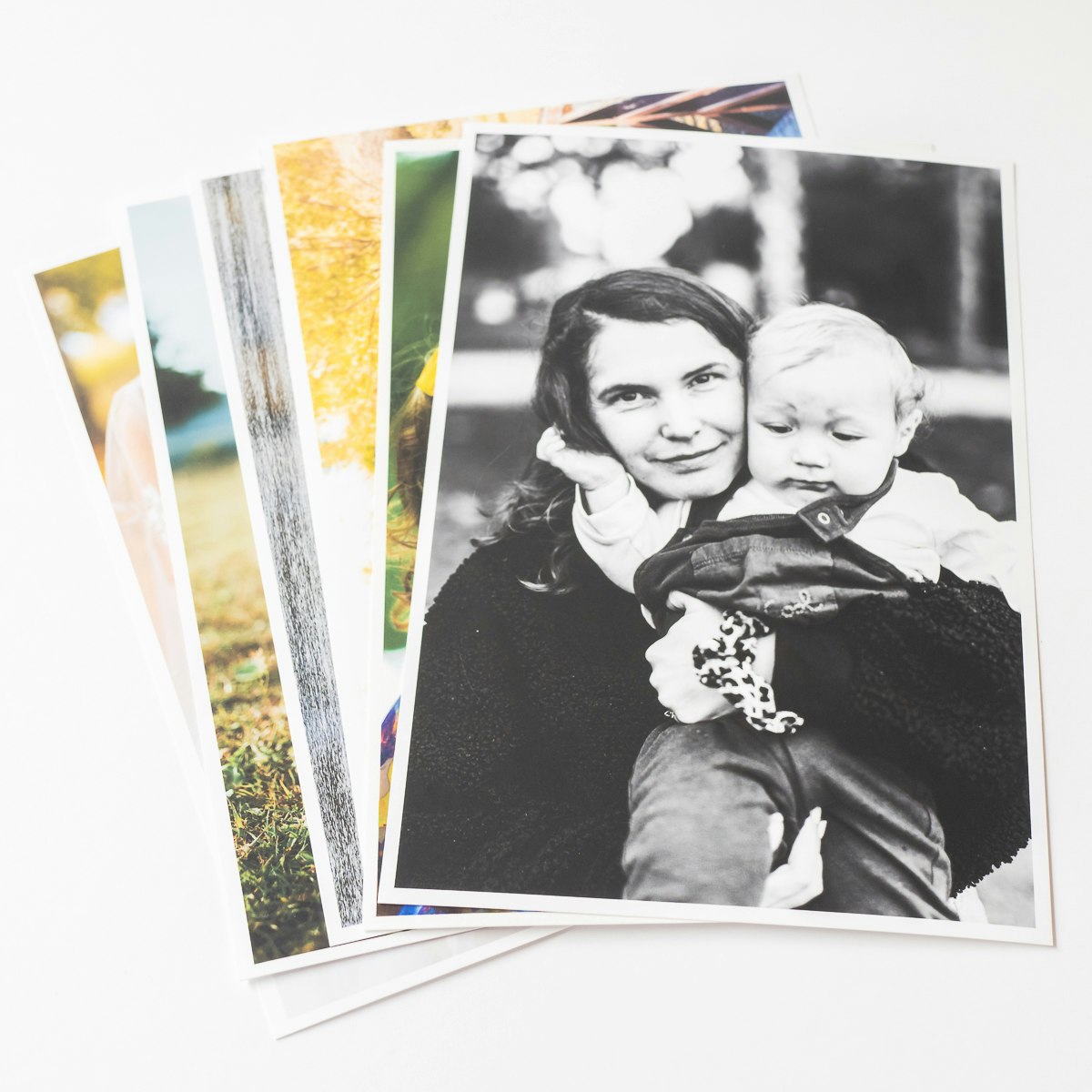 Create show-stopping contrast by including a few black and white prints. - Classic photo prints - HappyMoose