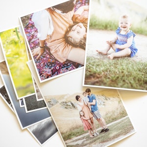 Loose classic photo prints on a table