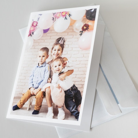 Upload your photo to create your personalised folded card.