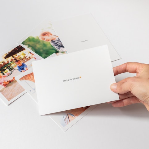 Print your favourite photos with the option to include text on the back.